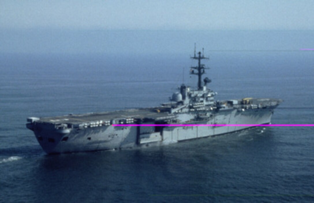 President Clinton has ordered the amphibious assault ship USS Guam (LPH 9), shown in this file photo, to steam towards the coast of Liberia to assist in the evacuation of U.S. citizens and foreign nationals known as Operation Assured Response. Joining the Guam will be the amphibious transport dock ship USS Trenton (LPD 14) and the dock landing ship USS Portland (LSD 37). All three ships are designed to support amphibious operations via helicopters or landing craft. The Guam carries a complement of U.S. Marine Corps CH-53 Sea Stallion and CH-46 Sea Knight helicopters. 