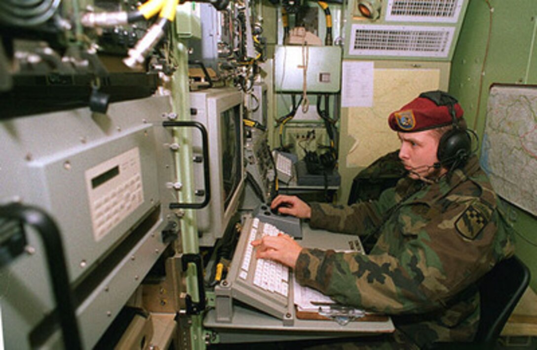 A U.S. Army specialist with the 319th Military Intelligence Battalion operates a synthetic aperture radar terminal that is receiving information from the airborne Joint Surveillance Target Attack Radar System, known as Joint Stars, during Operation Joint Endeavor on Jan. 31, 1996. The Boeing E-8 Joint Stars aircraft monitors personnel, vehicle and troop movements and relays the information to ground stations such as this one near Kaposvar, Hungary, for use by operational commanders. U.S. troops are deployed to Hungary to support the NATO Implementation Force (IFOR) in Bosnia and Herzegovina. 