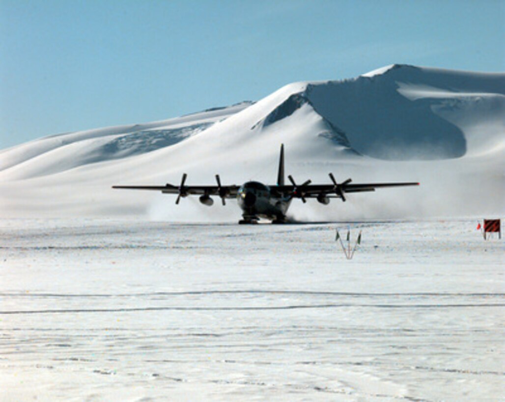 A U.S. Navy LC-130 Hercules ski-equipped cargo plane prepares to take off from a remote National Science Foundation field camp on Shackleton Glacier, Antarctica on Jan. 22, 1996. NASA astronomers and glaciologists spent over seven weeks here searching for meteorites and the clues they hold about the creation of our solar system. The National Science Foundation, U.S. Navy, Air Force, Coast Guard and Army work together to support scientific research year round. 