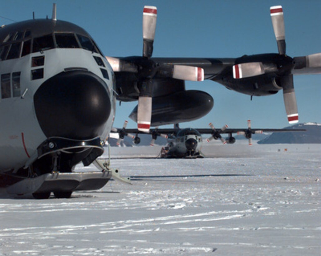 A U.S. Navy LC-130 Hercules ski-equipped cargo plane prepares to take off from a remote National Science Foundation field camp on Shackleton Glacier, Antarctica on Jan. 22, 1996. NASA astronomers and glaciologists spent over seven weeks here searching for meteorites and the clues they hold about the creation of our solar system. The National Science Foundation, U.S. Navy, Air Force, Coast Guard and Army work together to support scientific research year round. 