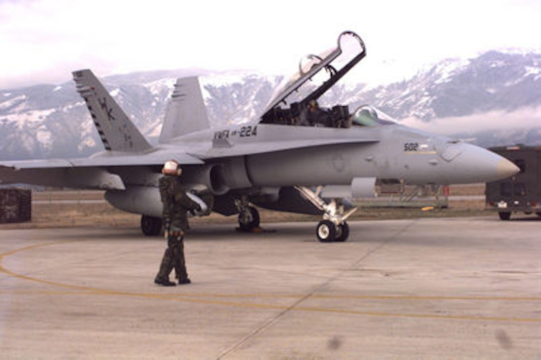 The crew of a U.S. Marine Corps F/A-18 Hornet prepares for taxi and take-off from Aviano Air Base, Italy, on Dec. 28, 1995, on a training mission. The Marines and their aircraft are deployed to Aviano from Fighter Attack (All Weather) Squadron 224 of Beaufort, S.C. 