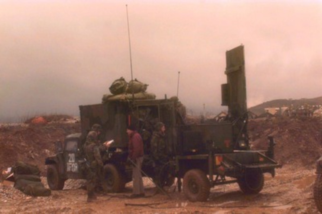 U.S. Army soldiers perform an operations check on a AN/TPQ-36 Fire Finder Radar erected behind the Sarajevo Aerodrome in Bosnia and Herzegovina on Dec. 27, 1995. The Fire Finder Radar has the capability to determine where a round was fired from, where it will land and will compute coordinates for a counterattack if needed. The radar can track artillery rounds, mortars, and rounds as small as .50-caliber. The soldiers are from Target Acquisition Battery Bravo, 25th Field Artillery Regiment, U.S. Army Europe and are deployed as part of the NATO Implementation Force (IFOR) in Bosnia and Herzegovina for Operation Joint Endeavor. 