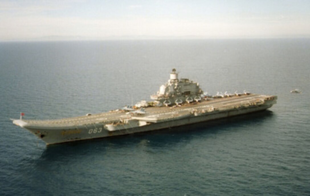 The Russian Aircraft Carrier Adm. Kuznetsov became the meeting place for the First Deputy Commander of the Russian Navy and the Commander of the U.S. Navy's Sixth Fleet as it steamed in the Mediterranean Sea on Jan. 7, 1996. Russian Adm. Igor Kasatonov invited Vice Adm. Donald L. Pilling, U.S. Navy, aboard the Russian carrier to discuss potential professional contacts between the two navies during the Adm. Kuznetsov deployment in the Mediterranean. The American delegation was hosted to a tour of the ship, a display of embarked aircraft and a traditional Russian meal. The Russian carrier is in the Mediterranean to show the flag and help commemorate the Russian Navy's 300th anniversary. 