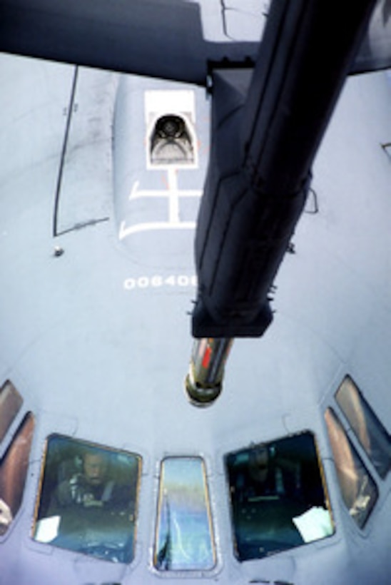 A C-141 Starlifter flies closer to the refueling boom of a KC-10 Extender as the two prepare to link up during the aerial refueling competition on June 25, 1996, as part of Airlift Rodeo '96. Airlift Rodeo '96 is the United States Transportation Command's tanker/airlift competition which tests the flight and ground skills of aircrews as well as the related skills of combat control, security police, aerial port, aeromedical evacuation, and maintenance team members. Crews from the U.S. and nine other countries are participating in the competition held this year at McChord Air Force Base, Wash. The C-141 and KC-10 are from the 305th Air Mobility Wing, McGuire Air Force Base, N.J. 