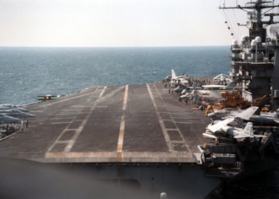 An E-2C (Hawkeye) from Airborne Early Warning Squadron One Two One (VAW-121) makes its final approach to the flight deck of the nuclear powered aircraft carrier USS George Washington (CVN 73) on April 17, 1996. The Hawkeye had just returned from flying a mission over Kuwait and southern Iraq in support of Operation Southern Watch. The USS George Washington is currently deployed to the Arabian Sea. 