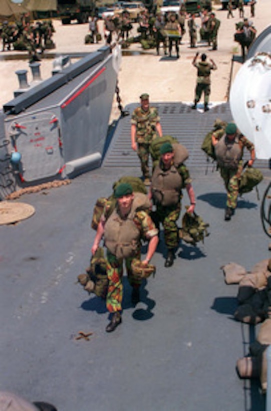 British Royal Marines from 3 CDO, board a U.S. Navy Landing Craft Utility at Radio Island near Morehead City, N.C., on May 4, 1996, for Combined Joint Task Exercise 96. More than 53,000 military service members from the United States and the United Kingdom are participating in Combined Joint Task Force Exercise 96 on military installations in the Southeastern United States and in waters along the Eastern seaboard. The Royal Marines are part of a liaison unit to the 8th Marine Regiment. 