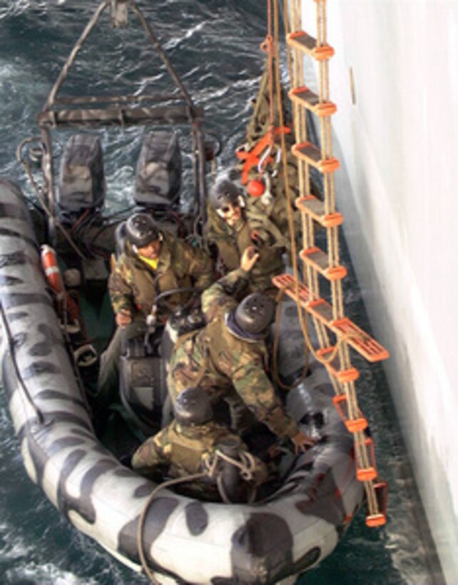 U.S. Navy SEAL's from Naval Special Warfare Group Two rehearse ship-to-ship boarding procedures using Zodiac RIB boats deployed from the coastal patrol boat USS Chinook (PC 9), on April 28, 1996, during Combined Joint Task Force Exercise '96. More than 53,000 military service members from the United States and the United Kingdom are participating in Combined Joint Task Force Exercise 96 on military installations in the Southeastern United States and in waters along the Eastern seaboard. 