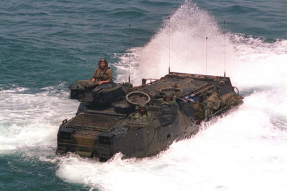 A U.S. Marine Amphibious Assault Vehicle from Delta Company, 2nd Amphibious Assault Battalion, 2nd Marine Division, prepares to enter the well deck of the USS La Moure County (LST 1194), during Combined Joint Task Force Exercise '96, on May 5, 1996. More than 53,000 military service members from the United States and the United Kingdom are participating in Combined Joint Task Force Exercise 96 on military installations in the Southeastern United States and in waters along the Eastern seaboard. 