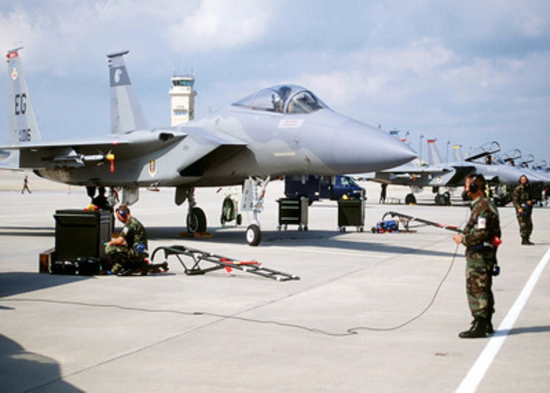Staff Sgt. Doug Ruggerio prepares to launch a F-15 Eagle from Tyndall Air Force Base, Fla., on Oct. 22, 1996, during William Tell '96. William Tell is an annual competition designed to challenge the air-to-air capabilities of combat air forces and have their crews perform under simulated combat conditions. Ruggerio is a crew chief with the 33rd Fighter Wing, Eglin Air Force Base, Fla. 
