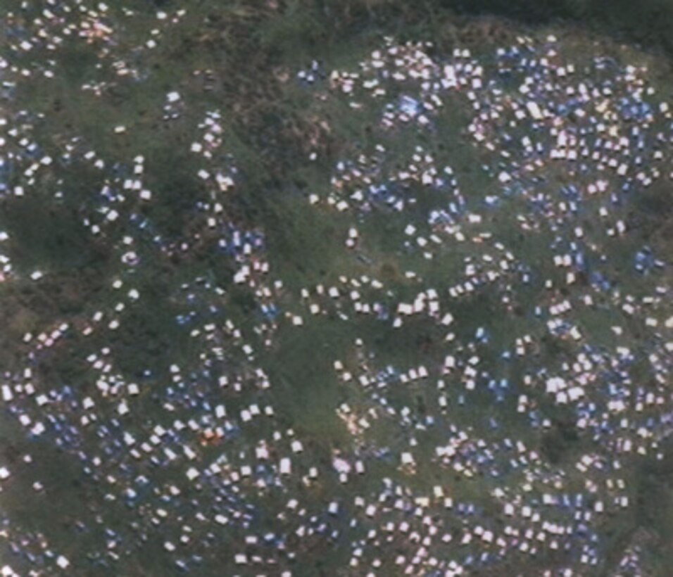 U.S. Navy aerial photograph of a refugee camp in the vicinity of Mumbi, Zaire, taken on Nov. 16, 1996. 