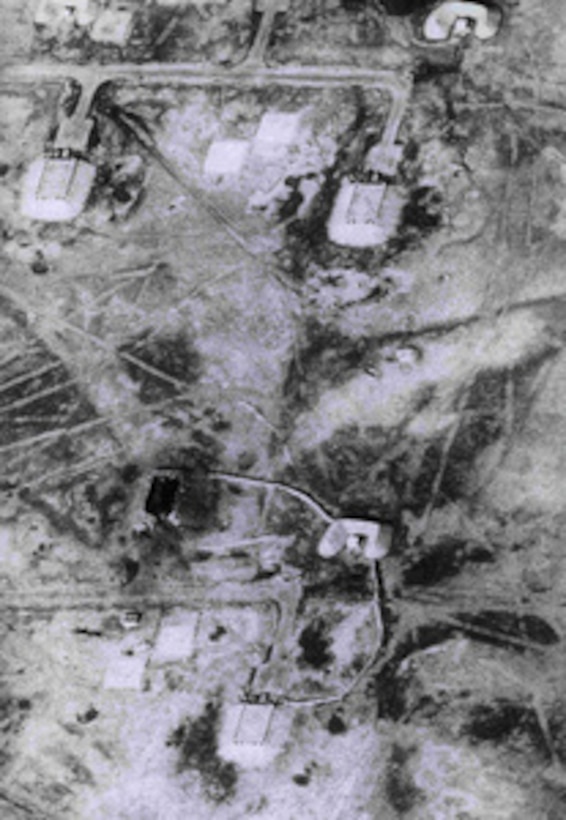 Aerial photograph taken on March 1, 1991, of the Khamisiyah Ammunition Storage Complex in Southern Iraq showing a destroyed bunker (lower left). 