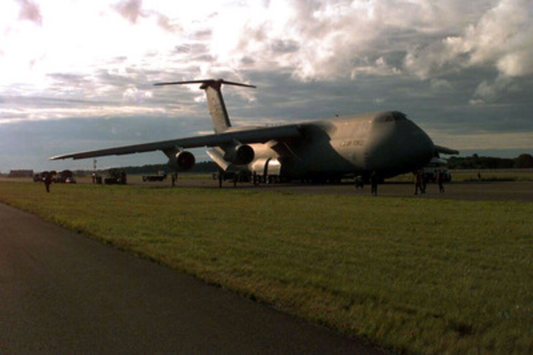 A U.S. Air Force C-5A Galaxy unloads 44 Marines and 29 pallets of their equipment at the airport in Tallinn, Estonia, on July 11, 1997, for Exercise Baltic Challenge 97. Baltic Challenge '97 is a multinational exercise conducted as a NATO Partnership for Peace initiative involving more than 2,600 military personnel from Denmark, Estonia, Finland, Latvia, Lithuania, Norway, Sweden, and the U.S. The focus of the training is peacekeeping tasks and humanitarian assistance operations. 