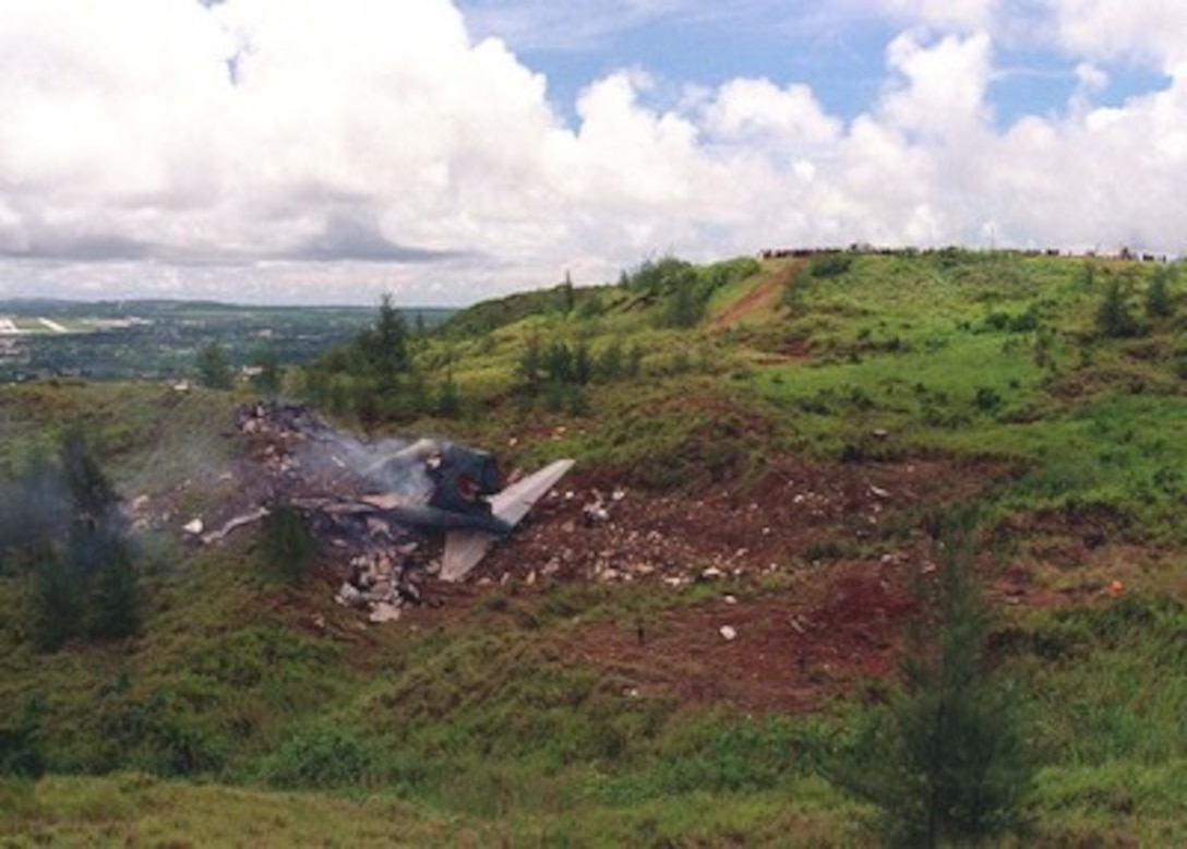 Aerial views of Sasa Valley crash site of Korean Airlines flight 801 on Aug. 6, 1997.  U.S. Navy, U.S. Coast Guard, U.S. Air Force, and numerous civilian rescue teams, currently assisting in the search and rescue efforts of KAL flight 801, evacuated survivors from the crash site during the early morning of August 6th. 