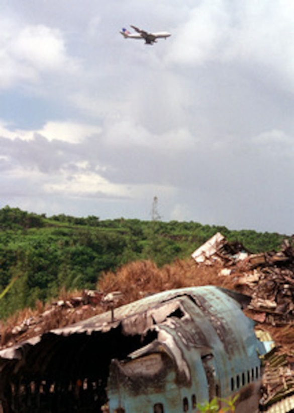 Commercial flights, following the same flight pattern and approach as did KAL Flight 801, continue to arrive on Guam. U.S. Navy, Air Force, Coast Guard, local civilian disaster teams and Nation Transportation Safety Board (NTSB) officials continue crash and salvage operations at the KAL Flight 801 crash site in Guam. 