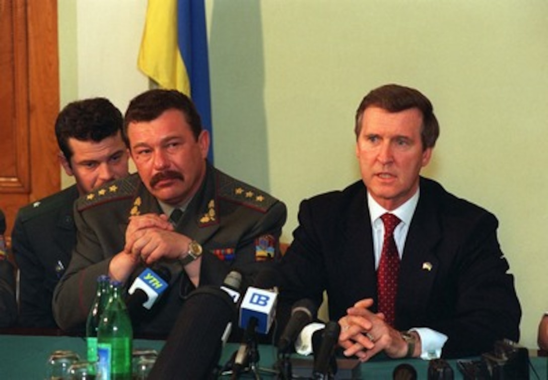 Following their meeting at the Ministry of Defense in Kiev, Ukraine, July 12, 1997, Secretary of Defense William Cohen (right) and Ukrainian Defense Minister Olexandr Kuzmuk (left) hold a press conference at the Academy of the Armed Forces. Cohen said that their morning meeting had included discussions of the newly-signed NATO-Ukraine Charter and its importance in promoting the democracy, stability and prosperity of Europe. Improvements to the NATO Partnership for Peace program, of which Ukraine is a leading member, were explored, as were the cooperative sharing of information and technology, for example, in the area of military mapping and medicine. 
