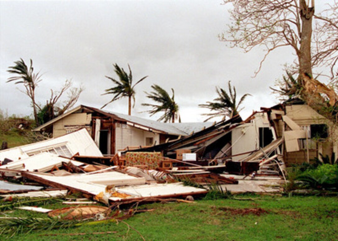 Military quarters in the Nimitz Hill housing area near Naval Station Marianas, Guam, lie smashed in the aftermath of super typhoon Paka on Dec. 17, 1997. Super typhoon Paka hit the island the night before with average sustained winds of 175 mph. One wind gust recorded at nearby Anderson Air Force Base was the strongest ever recorded on earth at 236 mph. 