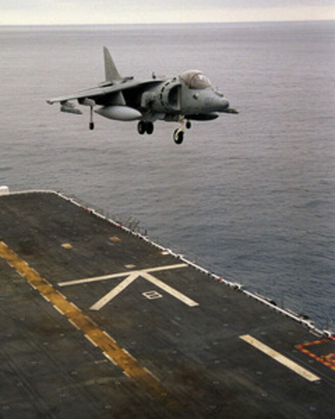 A U.S. Marine Corps AV-8B Harrier hovers over the deck of the USS Peleliu (LHA 5) as the ship operates off the coast of Camp Pendleton, Calif., on June 20, 1997, during Exercise Kernel Blitz 97. Kernel Blitz 97 is a major amphibious exercise taking place in Southern California and waters offshore. More than 12,000 sailors, Marines, soldiers, guardsmen and airmen are involved in the exercise which is designed to test the Navy-Marine Corps team's ability to project combat power ashore. The Harrier is deployed from Marine Attack Squadron 214, Marine Corps Air Station Yuma, Ariz. 