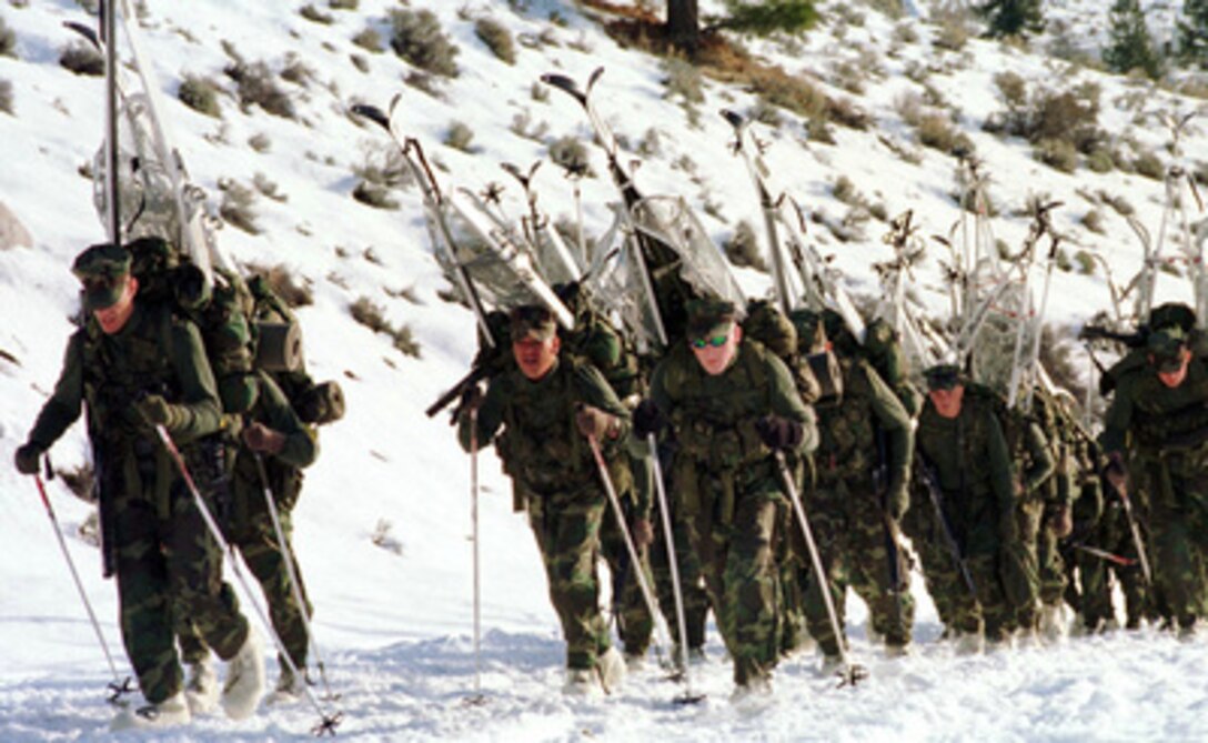 Marines from Lima Company, 3rd Battalion, 8th Marines, march up to Silver Creek, Calif., on Jan. 31, 1997, where they will begin their training in tactical operations in the arctic environment. Marines from the 2nd Marine Regiment and 3rd Battalion, 8th Marines of Camp Lejeune, N. C. are at the Mountain Warfare Training Center to train in cold weather survival and arctic warfare. 