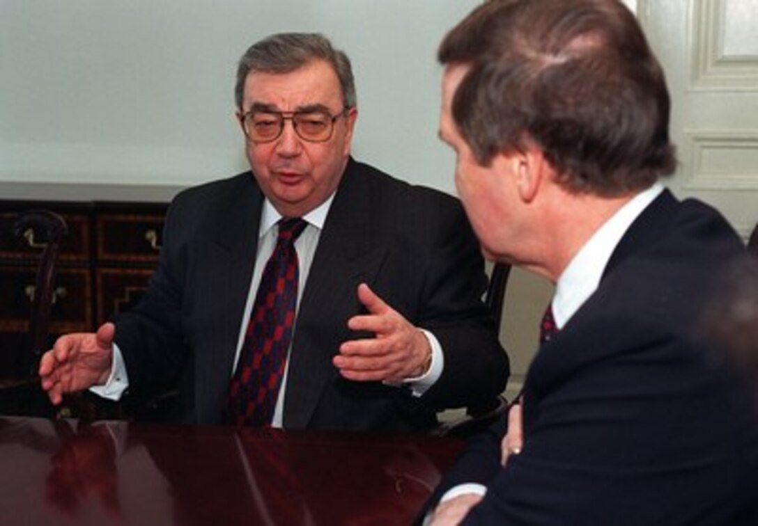 Russian Foreign Minister Yevgeny Primakov (left) talks with Secretary of Defense William S. Cohen (right) during his visit to the Pentagon, March 16, 1997. Among the topics on the agenda for discussion were NATO enlargement and START II, the Strategic Arms Reduction Treaty, which has yet to be ratified by the Russian Duma. 