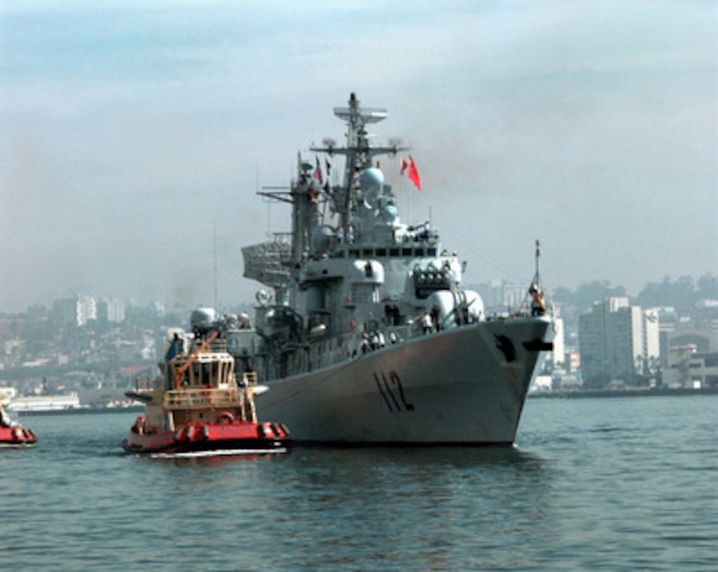 The People's Republic of China destroyer Harbin (DD 112) pulls into San Diego, Calif., on March 21, 1997, for a first-ever visit by People's Republic of China Navy ships to the mainland U.S. Harbin and two other People's Republic of China ships are visiting Southern California for the second part of a goodwill visit between the U.S. and Chinese navies. The ships visited Hawaii on their way to San Diego. The U.S. and the People's Republic of China navies are the two largest fleets in the Asia-Pacific region. Interaction between the two navies increases mutual understanding and confidence. During the visit Chinese sailors will have the opportunity to meet their U.S. Navy counterparts, tour U.S. ships and experience American culture in Southern California. The destroyers Harbin and Zhuhai, and supply ship Nancang will moor next to the U. S. Navy's aircraft carrier USS Constellation (CV 64), at Naval Air Station North Island. 