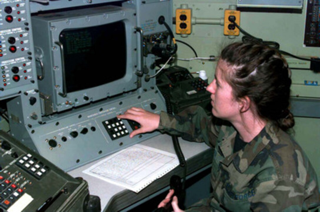 Senior Airman Cassandra Dyer, a computer and communications operator, provides telephone operator assistance to participants of Exercise Roving Sands '97 on April 21,1997. More than 20,000 service members from all branches of the armed forces of the U.S., Canada, Germany, and the Netherlands are participating in Exercise Roving Sands '97. The exercise is designed to refine their skills in operations using an integrated air defense network of ground, missile and radar early warning systems combined with tactical fighter and bomber aircraft operating in a simulated high-threat environment. Dyer, who is attached to the 729th Air Control Squadron, is one of the many U. S. and international military members providing command and control communications for Roving Sands '97. 