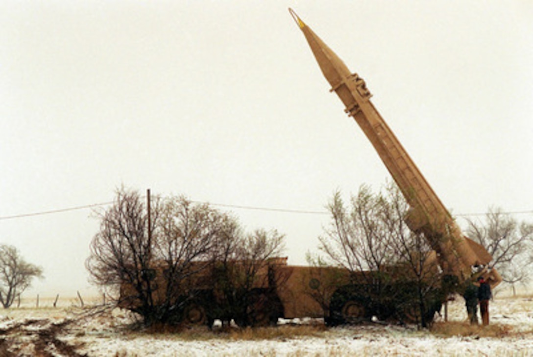 Members of the opposing forces provide a strong sense of reality for Exercise Roving Sands '97 participants as they set up a SCUD missile site at Roswell, N.M., on April 26, 1997. More than 20,000 service members from all branches of the armed forces of the U.S., Canada, Germany, and the Netherlands are participating in Exercise Roving Sands '97. The exercise is designed to refine their skills in operations using an integrated air defense network of ground, missile and radar early warning systems combined with tactical fighter and bomber aircraft operating in a simulated high-threat environment. 