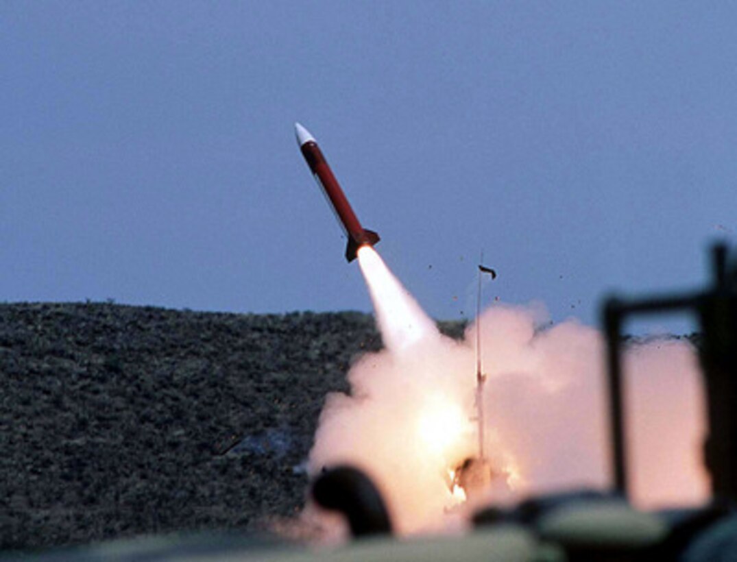 A Patriot missile is launched by soldiers of the 11th Brigade, 43rd Air Defense Artillery, at McGregor Range near El Paso, Texas, on April 30, 1997. More than 20,000 service members from all branches of the armed forces of the U.S., Canada, Germany, and the Netherlands are participating in Exercise Roving Sands '97. The exercise is designed to refine their skills in operations using an integrated air defense network of ground, missile and radar early warning systems combined with tactical fighter and bomber aircraft operating in a simulated high-threat environment. The 43rd Air Defense Artillery is deployed for the exercise from Fort Bliss, Texas. 