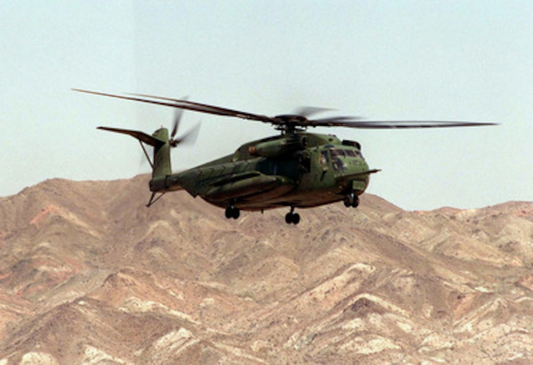 A U.S. Marine Corps CH-53 Sea Stallion helicopter makes a final approach for landing on the desert floor near Yuma, Ariz., on April 17, 1997, during Exercise Desert Punch. Desert Punch is a simulated helicopter assault mission involving over 60 helicopters from nine squadrons of Marine Aircraft Group 16. The helicopters launched from Marine Corps Air Stations El Toro and Tustin, Calif., and rendezvoused at the designated landing zone outside Yuma. 