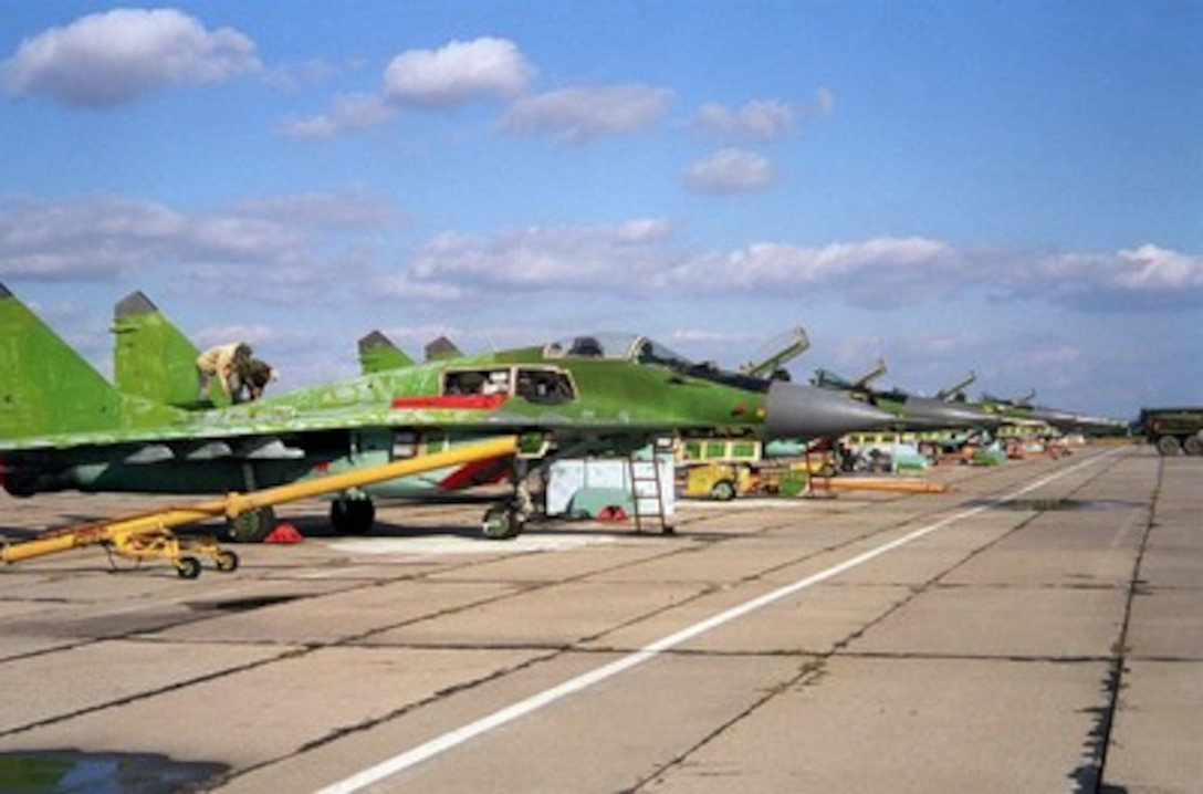 A nuclear-capable MiG-29C is readied for air shipment from Moldova to the United States on Oct. 16, 1997. The Department of Defense of the United States of America and the Ministry of Defense of the Republic of Moldova recently reached an agreement to implement the Cooperative Threat Reduction accord signed on June 23, 1997, in Moldova. This agreement authorized the United States Government to purchase nuclear-capable MiG-29 fighter planes from the Government of Moldova. This is a joint effort by both governments to ensure that these dual-use military weapons do not fall in to the hands of rogue states. 