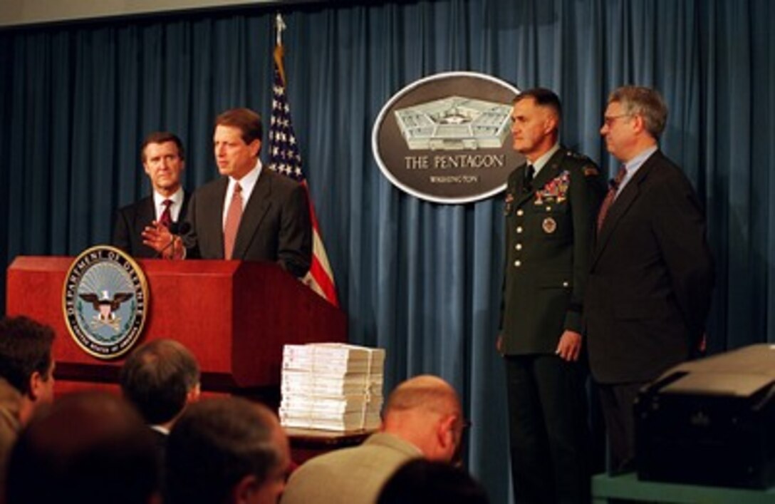 Vice President Al Gore (center) delivers his opening remarks at a Pentagon press briefing announcing the Defense Reform Initiative on Nov. 10, 1997. Gore joined Secretary of Defense William S. Cohen (left) in announcing the Defense Reform Initiative which will aggressively apply to the Department those business practices that American industry has successfully used to become leaner and more flexible in order to remain competitive. Gore endorsed the effort as exemplifying the objectives of the National Performance Review. Joining Cohen and Gore on the dais are Chairman of the Joint Chiefs of Staff, Gen. Henry H. Shelton, U.S. Army, and Deputy Secretary of Defense John J. Hamre. 