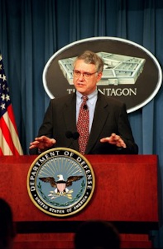 Deputy Secretary of Defense John J. Hamre responds to a reporter's question during the announcement of the Defense Reform Initiative at a Pentagon press briefing on Nov. 10, 1997. This Defense Reform Initiative will aggressively apply to the Department those business practices that American industry has successfully used to become leaner and more flexible in order to remain competitive. 