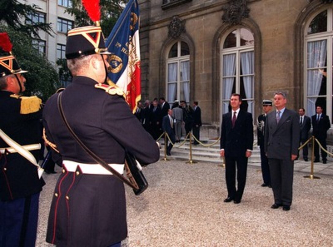 Minister of Defense Alain Richard (right) hosts an armed forces honors ceremony to welcome Secretary of Defense William S. Cohen (left) to Paris on October 6, 1997. 