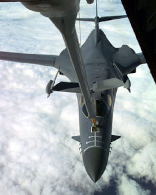 A U.S. Air Force B-1B Lancer bomber receives an in-flight refueling from a KC-10 Extender as the two aircraft fly over the Mediterranean Sea on Nov. 24, 1997. The Lancer will join a large force of over 170 U.S. Air Force aircraft in the region providing support to Operation Southern Watch which is the U.S. and coalition enforcement of the no-fly-zone over Southern Iraq. The long-range heavy bomber is deploying to the Persian Gulf area of operations from the 37th Bomb Squadron, Ellsworth Air Force Base, S.D. 