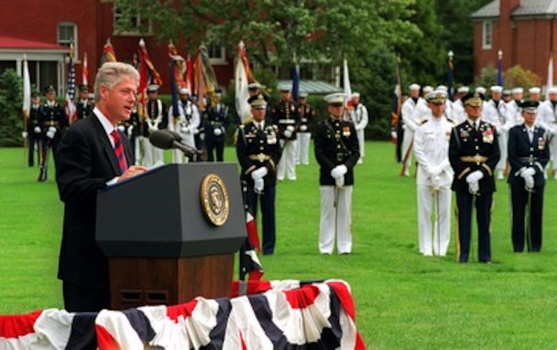 President Bill Clinton praises his senior military adviser Chairman of the Joint Chiefs of Staff Gen. John M. Shalikashvili, during his farewell ceremony at Fort Myer, Va., on Sept. 30, 1997. Shalikashvili is retiring from the U.S. Army and his job as the nation's senior military officer and will be succeeded by Gen. Henry H. Shelton, U.S. Army. 