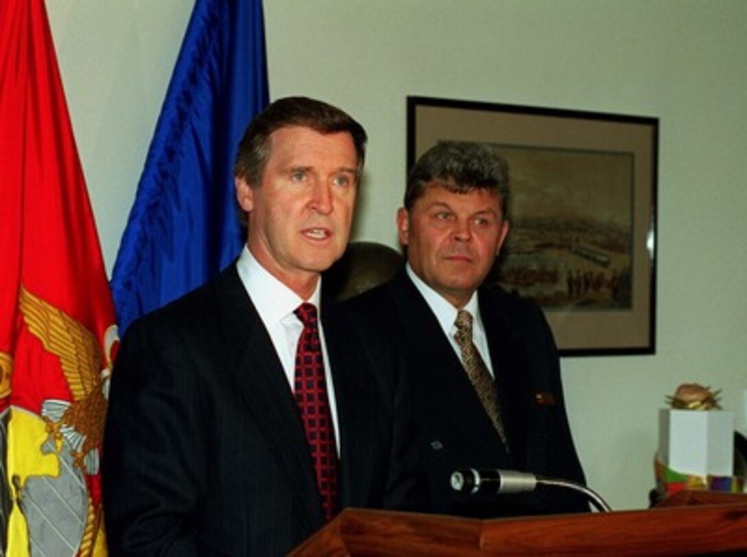 Secretary of Defense William S. Cohen (left) responds to a reporter's question during a joint media availability with Minister of National Defense Ceslovas Stankevicius (right), of the Republic of Lithuania, in the Pentagon on Oct. 16, 1997. 