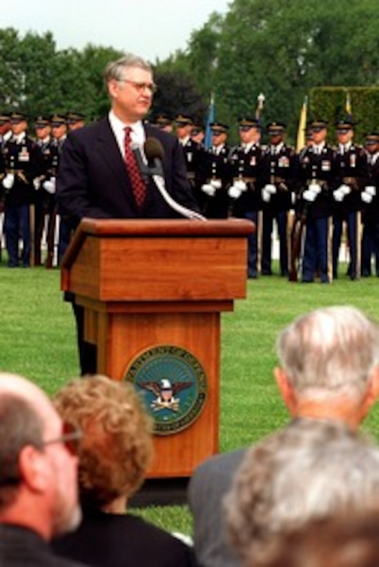Deputy Secretary of Defense John J. Hamre addresses the guests attending his Full Honors Review and Welcoming Ceremony on Sept. 8, 1997. Hamre was sworn in as the 26th Deputy Secretary of Defense on July 29, 1997. 