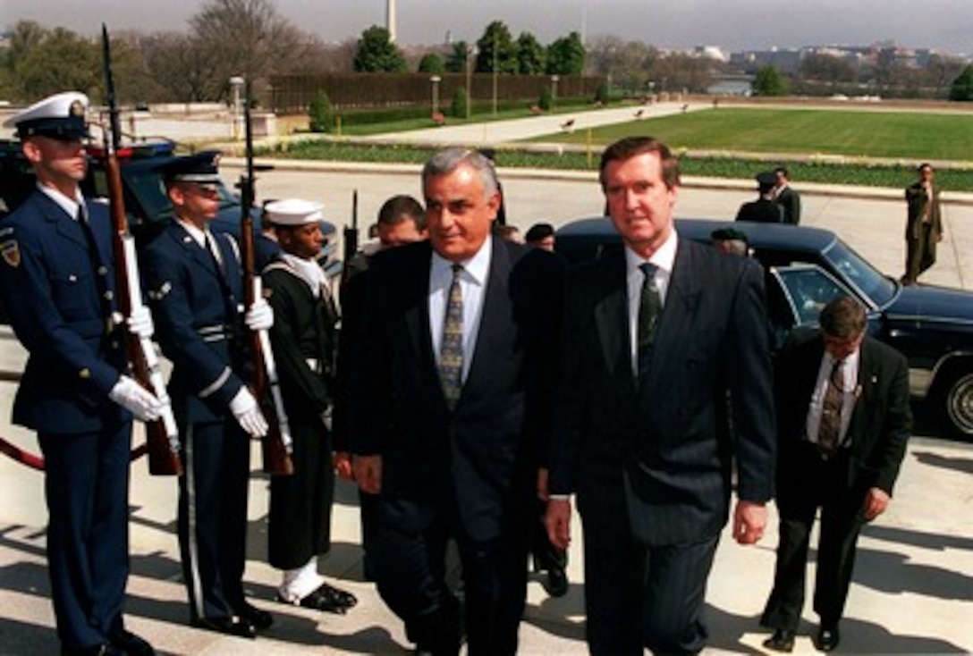 Secretary of Defense William Cohen (right) escorts visiting Israeli Defense Minister Yitzhak Mordechai into the Pentagon, March 27, 1998. The two men will meet in private and also with advisors over a working lunch, to discuss a range of security issues of interest to both nations. 