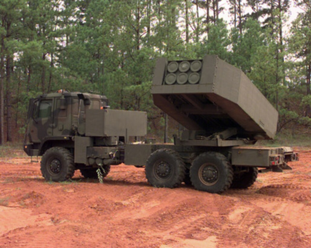 Soldiers from Charlie Company, 3/27 Field Artillery Regiment out of Fort Bragg, N.C., get ready to aim their High Mobility Artillery Rocket System (HIMARS) as part of the Rapid Force Projection Initiative field experiment (RFPI). This experiment is being used to test new equipment and its usefulness with the light forces in the field. 