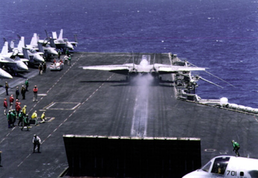 An F-14B from Fighter Squadron ONE FOUR THREE (VF-143) catapults off the flight deck of aircraft carrier USS John C. Stennis CVN 74 during flight operations in the Persian Gulf. Stennis is deployed to the Persian Gulf in support of Operation Southern Watch. 