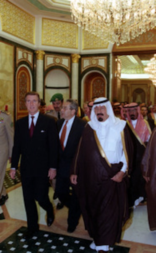 Secretary of Defense William Cohen (left) walks with Crown Prince Abdallah bin Abd al-Aziz Al Saud (right), following their meeting on Nov. 3, 1998, in Riyadh, Saudi Arabia. Cohen met with Prince Abdallah and with his brother, King Fahd, to discuss planned military action by the United States and Great Britain against Iraq. This action was precipitated by Saddam Hussein's latest refusal to permit United Nations weapons inspectors to perform their duties. 