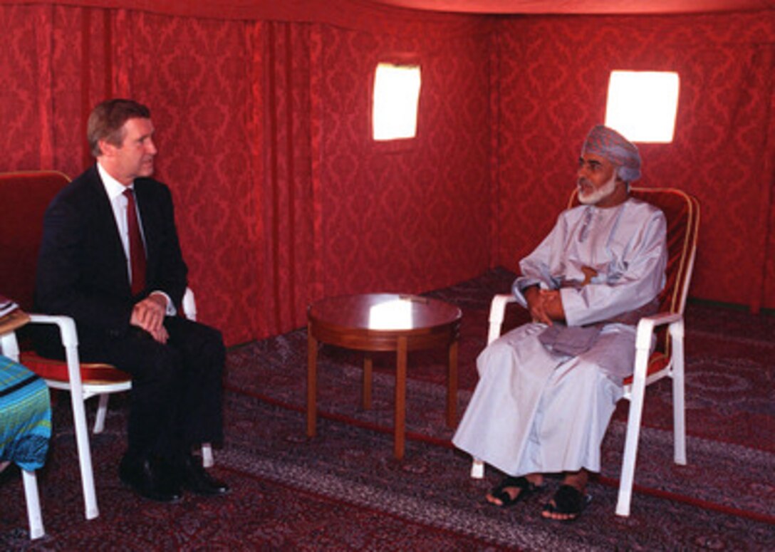 Secretary of Defense William Cohen (left) meets with Sultan Quboos bin Said Al-Said, ruler of Oman, in his desert encampment about 100 miles outside the city of Muscat, Oman, on Nov. 5, 1998. Cohen came to tell Quboos about the military action planned against Iraq by the United States and Great Britain if Saddam Hussein persisted in his refusal to allow United Nations weapons inspectors to perform their tasks. Oman was one of eleven nations Cohen visited with his message during his four-day trip to Europe and the Middle East. 