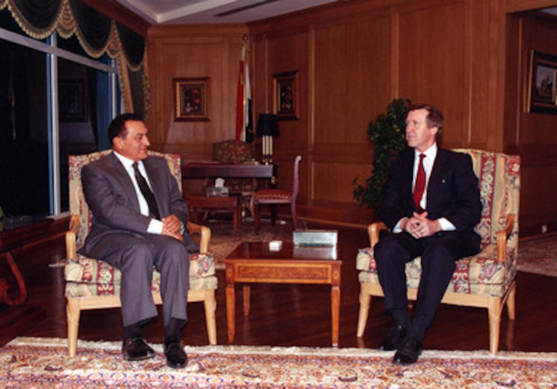 Secretary of Defense William Cohen (right) meets with Egyptian President Hosni Mubarak at Sharm Al Shiek, Egypt, on Nov. 5, 1998. Cohen wanted to discuss with Mubarak the planned military action to be taken by the United States and Great Britain against Iraq if Saddam Hussein continued to thwart weapons inspections by the United Nations Special Commission. Egypt was one of eleven nations Cohen visited with his message during an intense four-day tour of Europe and the Middle East. 