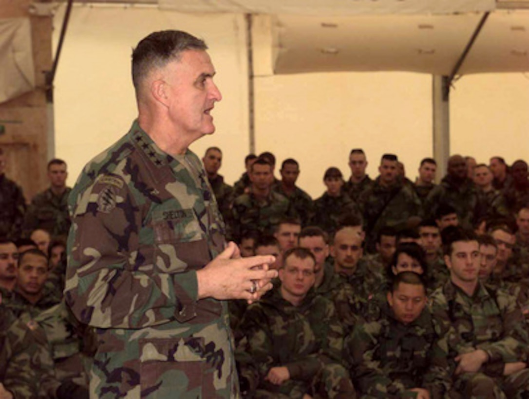 Chairman of the Joint Chiefs of Staff Gen. Henry H. Shelton, U.S. Army, talks to soldiers at Eagle Base in Tuzla, Bosnia and Herzegovina, on Dec. 22, 1998. Shelton spoke with soldiers about their Bosnia mission, education and the proposed pay raise for military personnel. The soldiers are deployed to Bosnia and Herzegovina in support of Operation Joint Forge. 