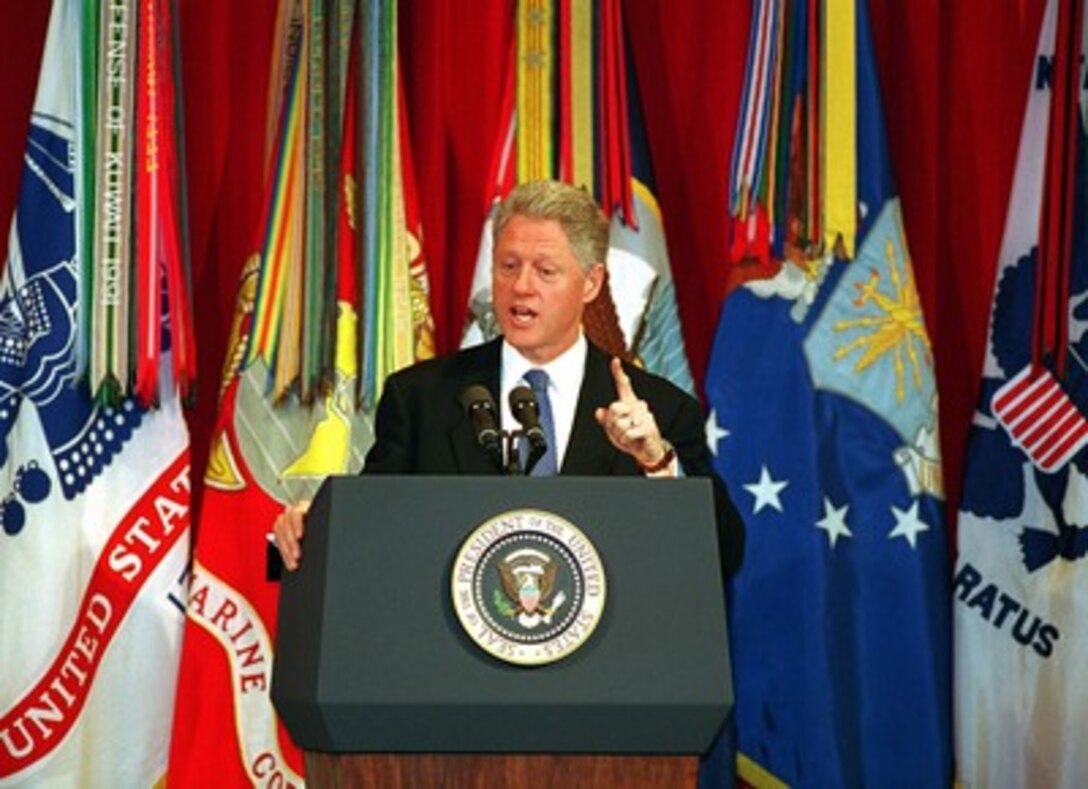 President Bill Clinton addresses an audience of military personnel and civilian Department of Defense employees at the Pentagon on Feb. 17, 1998. The internationally televised speech, in part a warning to Saddam Hussein, was in essence an explanation to the American people of why military action may be required against Iraq. 