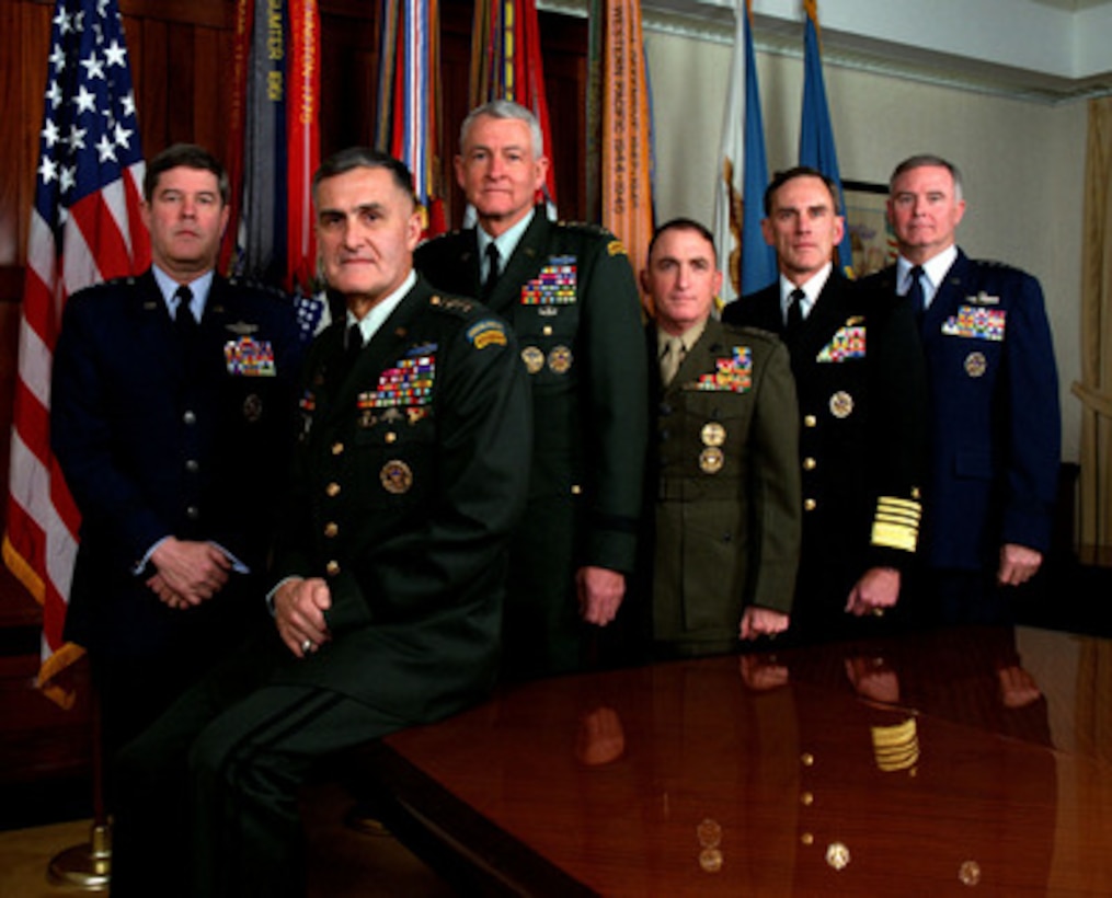 The Joint Chiefs of Staff, photographed in their traditional meeting place, the JCS Gold Room at the Pentagon on Dec. 18, 1997. From left to right are: Gen. Joseph W. Ralston, U.S. Air Force, vice chairman of the Joint Chiefs of Staff; Gen. Henry H. Shelton, U.S. Army, chairman of the Joint Chiefs of Staff; Gen. Dennis J. Reimer, U.S. Army, chief of staff; Gen. Charles C. Krulak, U.S. Marine Corps, commandant; Adm. Jay L. Johnson, U.S. Navy, chief of naval operations; Gen. Michael E. Ryan, U.S. Air Force chief of staff. 