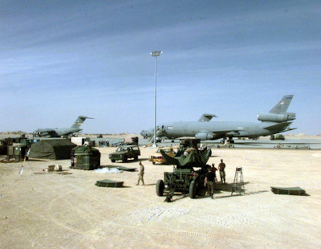 U.S. Air Force personnel from the 51st, 52nd and the 54th Combat Communications Squadrons set up a 20 foot Quick Reaction Satellite Antenna at an operating base in Southwest Asia on Feb. 16, 1998. Over 400 U.S. Air Force personnel are deployed to the Gulf region as part of an Air Mobility Command Tanker Task Force operating in the Southwest Asia theater in support of Operation Southern Watch. Southern Watch is the U.S. and coalition enforcement of the no-fly-zone over Southern Iraq. The antenna will give the deployed Tanker Task Force direct, worldwide communications. The 51st, 52nd and the 54th are deployed from Robins Air Force Base, Ga. 