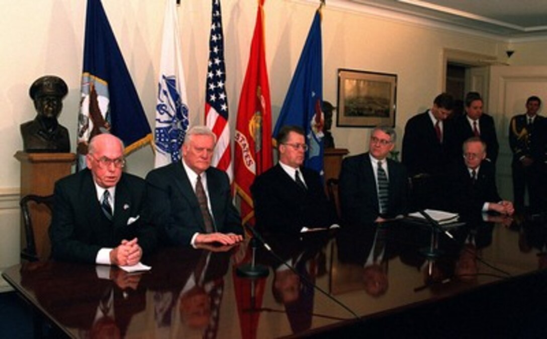 President Algirdas Brazauskas (left), of the Republic of Lithuania, speaks to the press following a signing ceremony in the Pentagon between the United States and the Republic of Latvia of a General Agreement on the Security of Military Information on Jan. 15, 1998. From left to right: President Brazauskas; President Lennart Meri, of the Republic of Estonia; President Guntis Ulmanis, of the Republic of Latvia; Deputy Secretary of Defense John J. Hamre; and Minister of Defense Talavs Jundzis, of the Republic of Latvia. 