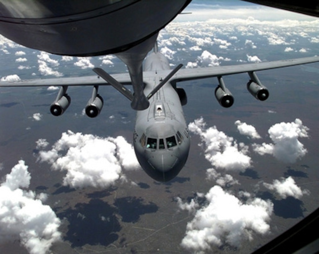 A C-141 Starlifter approaches the refueling boom of a KC-135 Stratotanker during Air Mobility Rodeo 98, June 23, 1998. Rodeo 98 tests the flight and ground skills of aircrews as well as the related skills of special tactics, security forces, aerial porters, aeromedical evacuation and maintenance members. The goal of the international airlift-tanker competition is to develop and improve techniques and procedures that enhance air mobility operations. The Starlifter is assigned to the 452nd Air Mobility Wing, March Air Force Base, Calif. The Stratotanker is from the 91st Air Refueling Squadron, MacDill Air Force Base, Fla. 