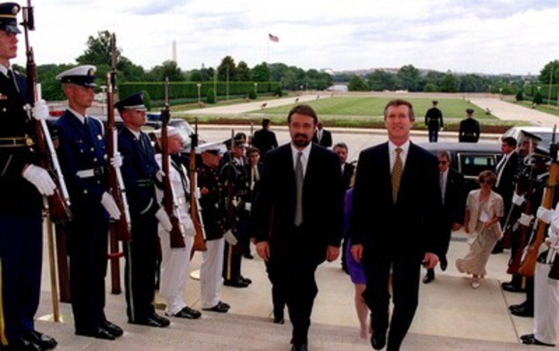 Secretary of Defense William S. Cohen (right) escorts Prime Minister Branko Crvenkovski (left) of The Former Yugoslav Republic of Macedonia into the Pentagon on June 30, 1998. 