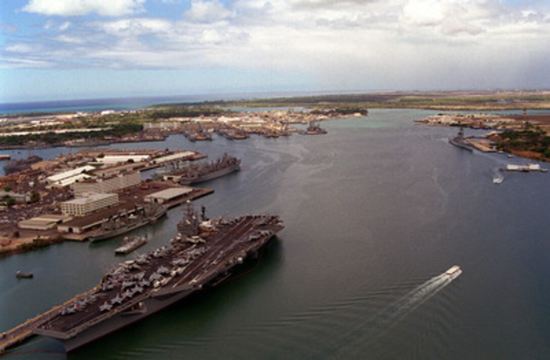 USS Carl Vinson CVN-70 arrives at naval base Pearl Harbor, Hawaii, in support of RIMPAC '98. RIMPAC '98 is designed to enhance the tactical capabilities of participating units in major aspects of maritime operations at sea. RIMPAC '98 is the sixteenth in a series of Pacific naval exercises. 